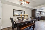 Mesa apartment for rent - A dining room with a table set for two and a bench at Del Coronado Apartment , Mesa, 85202