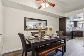 Mesa apartment for rent - A dining room with a table set for two and a bench at Del Coronado Apartment , Mesa, 85202