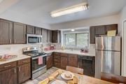Fort Collins apartment for rent - Well Equipped Kitchen And Dining at Governor's Park, Fort Collins, 80525
