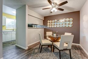 Colorado Springs apartment for rent - Dining room with a table and chairs and a ceiling fan  at Union Heights Apartments, Colorado Springs, CO