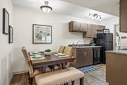 Wilmington apartment for rent - Dining area with a table and chairs at Lofts of Wilmington, Wilmington, NC