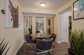 Albuquerque apartment for rent - Dining room with a table and chairs at Mountain Run Apartments, New Mexico, 87111