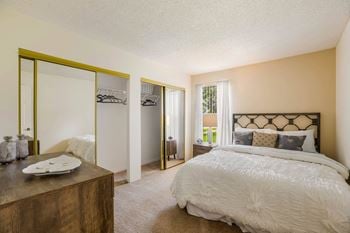 Bedroom with multiple closets