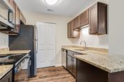 St. Charles apartment for rent - Granite Countertop Kitchen at Glen at Bogey Hills, St. Charles, MO, 63303