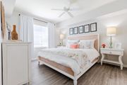 Jensen Beach apartment for rent - a bedroom with a bed and two nightstands at Heritage Bay, Florida