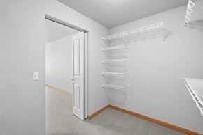 Tacoma apartment for rent - an empty bedroom with a closet and a door to the bathroom