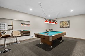 Tumwater apartment for rent - the preserve at ballantyne commons game room with pool table and bar