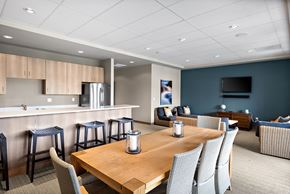Port Orchard apartment for rent - a conference room with a table and chairs and a kitchen