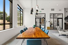Seattle apartment for rent - A conference room with a long table and chairs.