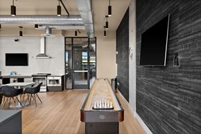 Tacoma apartment for rent - A room with a pool table and a bar area.