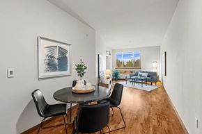 University Place apartment for rent - A dining room with a table and chairs.