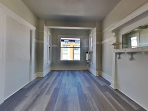 San Francisco apartment for rent - a living room with wood floors and a window