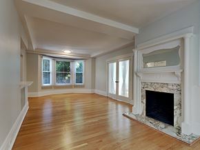 San Francisco apartment for rent - a living room with a fireplace and a wooden floor