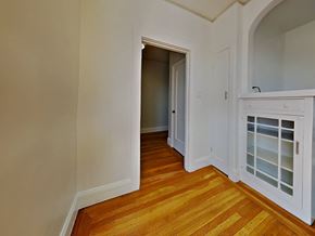 San Francisco apartment for rent - a bedroom with a door to a hallway and a door into a closet