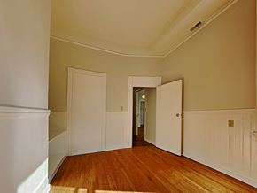 San Francisco apartment for rent - a bedroom with wood floors and white walls