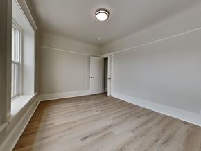 San Francisco apartment for rent - a living room with wood floors and white walls