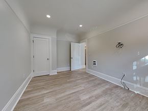 San Francisco apartment for rent - a newly renovated living room with white walls and wood flooring