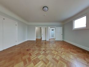 San Francisco apartment for rent - an empty living room with a hard wood floor