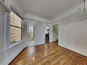 San Francisco apartment for rent - a living room with white walls and wood floors