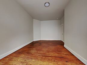 San Francisco apartment for rent - a empty room with wood floors and white walls