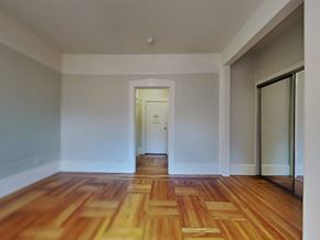 San Francisco apartment for rent - a living room with a wooden floor and white walls