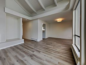 San Francisco apartment for rent - a living room with wood flooring and a large window