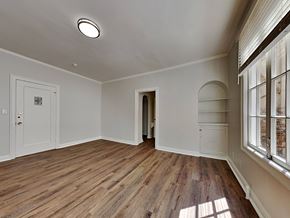 Oakland apartment for rent - a living room with white walls and wood floors