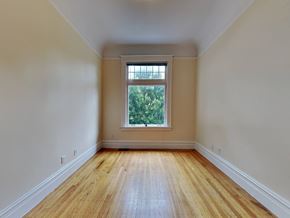 San Francisco apartment for rent - A room with wooden floors and a window.