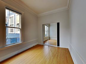 San Francisco apartment for rent - a living room with a hard wood floor and a large window