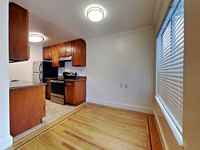 San Francisco apartment for rent - a kitchen with wood flooring and a large window