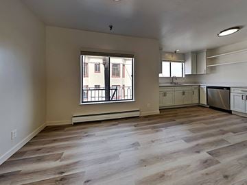 San Francisco apartment for rent - a renovated kitchen with white cabinets and a window