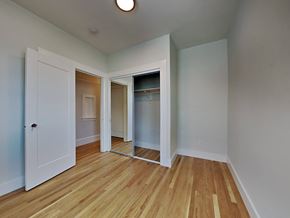 San Francisco apartment for rent - a bedroom with a closet and a mirrored closet door