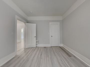 San Francisco apartment for rent - a brand new living room with white wood floors and white doors