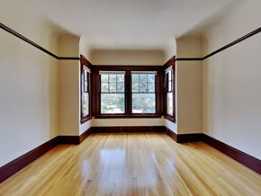 San Francisco apartment for rent - a empty room with wood floors and windows