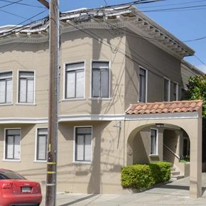 San Francisco apartment for rent - a building with a red car parked in front of it