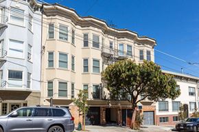 San Francisco apartment for rent - a building with a tree in front of it on a city street