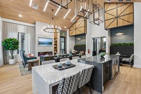 Wesley Chapel apartment for rent - A modern kitchen with a dining table and chairs.