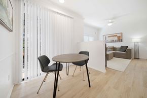 San Diego apartment for rent - A dining room with a table and chairs.