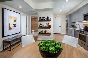 Los Angeles apartment for rent - a kitchen and dining room with a table and chairs
