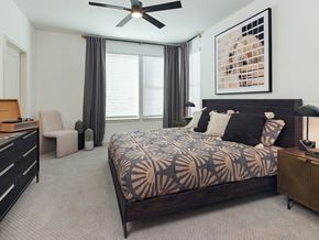 Mckinney townhouse for rent - spacious bedroom with carpet and king size bed