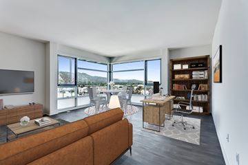 Glendale apartment for rent - A living room with a brown couch and a television.