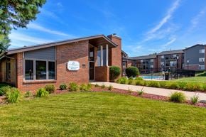 West Des Moines townhouse for rent - marketing office with apartments and pool in background