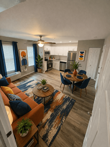 Jacksonville apartment for rent - A living room with a brown couch and a rug.