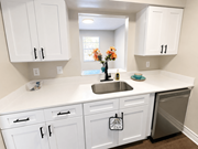 Jacksonville apartment for rent - A kitchen with white cabinets and a sink.