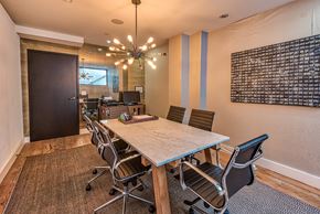 Los Angeles apartment for rent - A conference room with a long table and chairs.