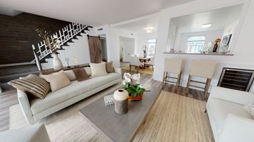 San Francisco townhouse for rent - A living room with a white couch and a wooden coffee table.