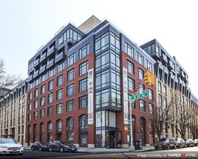 Brooklyn apartment for rent - a large building on the corner of a street