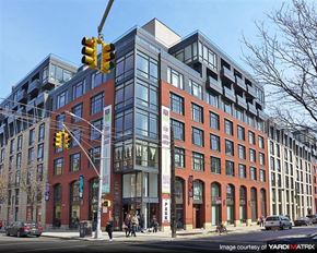 Brooklyn apartment for rent - a large building on the corner of a city street