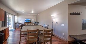 Steamboat Springs apartment for rent - A kitchen with a dining table and chairs.