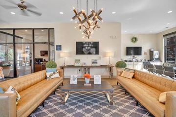 Charlotte apartment for rent - a living room with couches and a coffee table
